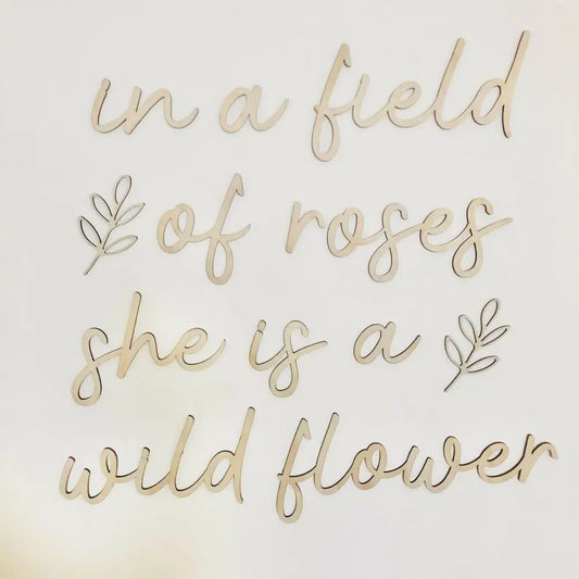 in a field of roses she is a wildflower wall plaque